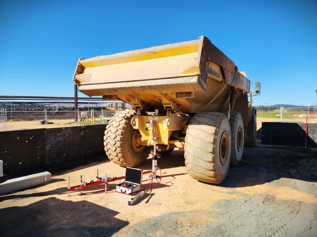 Plate load test set up under a loaded truck on site
